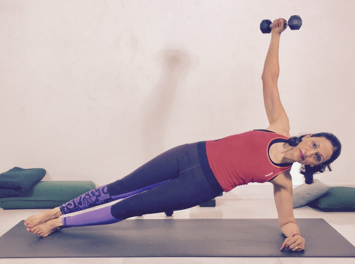 Weights in Forearm Side Plank Position