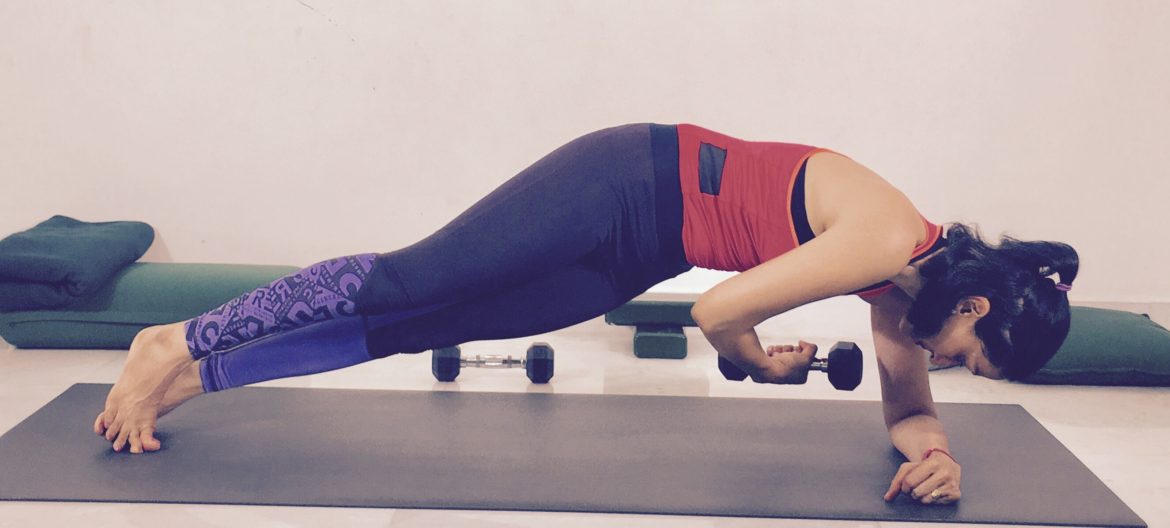 Weights in Forearm Side Plank Position 2